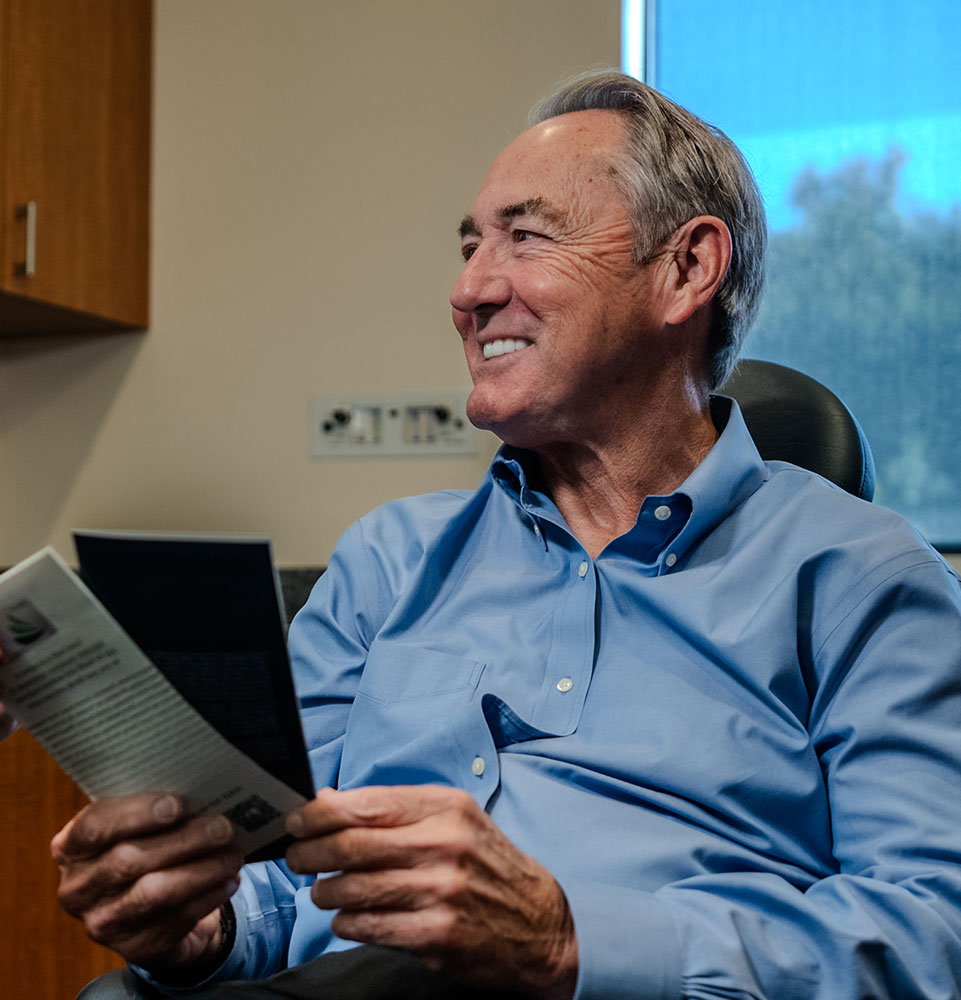 tony looking over dental financing options