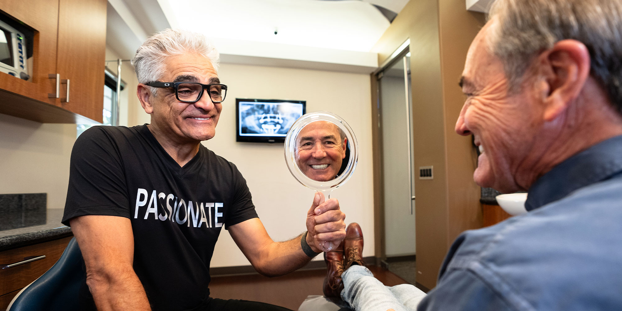 dr alijanian with mirror during reveal for tony
