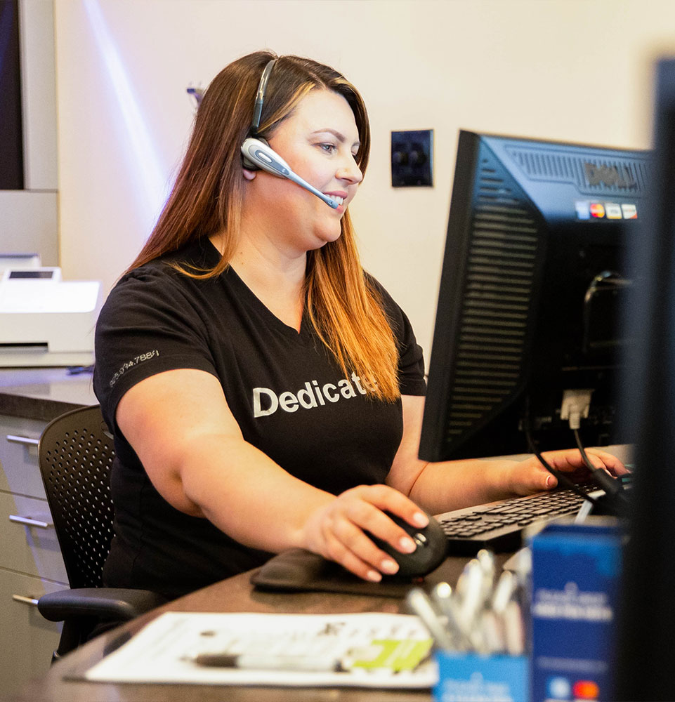 team member on the phone
